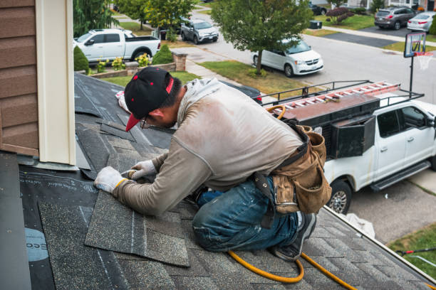 Professional Roofing technician working in Russellville, AR